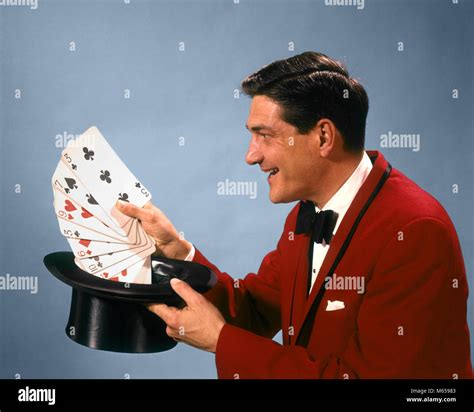 1960s 1970s MAN MAGICIAN RED SUIT BOW TIE PULLING OVERSIZE PLAYING ...