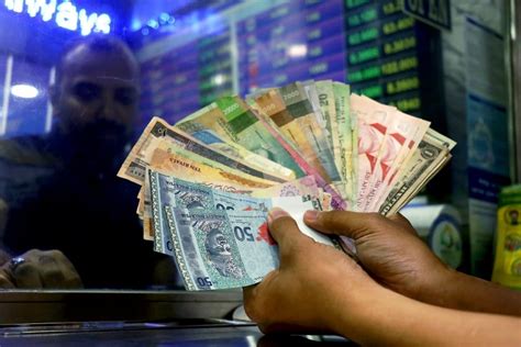 Ringgit Opens Slightly Higher Vs US Dollar