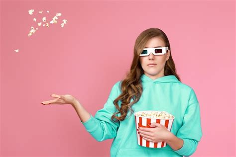 Premium Photo Pretty Woman Holding Bucket With Flying Popcorn Person