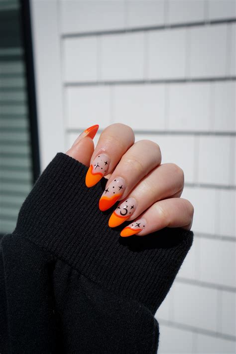 Manicure of the Month: Neon Orange Halloween Nails - living after midnite