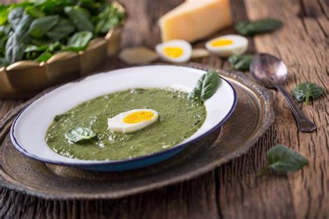 Spinach Soup Portion Spinach Soup With Egg And Cheese Parmesan In Retro Style Stock Image