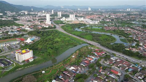 An aerial view of a residential area with a Sungai Juru river 26368102 ...