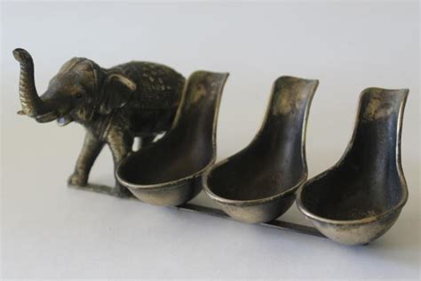 vintage smoking pipe holder, pipe stand w/ little bronze lucky elephant figure