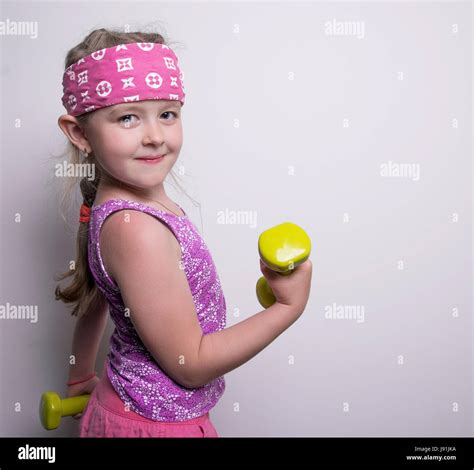 Cheerful Athlete With Dumbbells Stock Photo Alamy