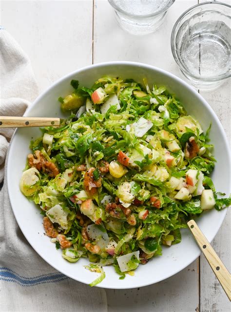 Kale And Brussels Sprout Salad With Walnuts Parmesan And Lemon Mustard