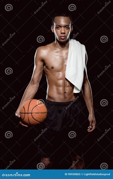 American Basketball Player Posing With Ball And Towel Stock Image