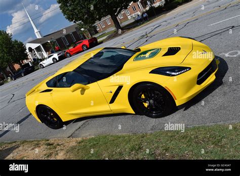 A Yellow C7 Corvette Stingray Coupe At A Car Show Stock Photo Alamy