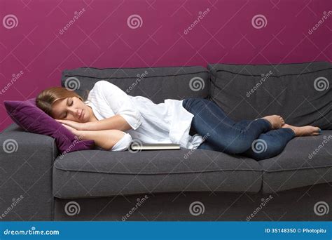 Woman Asleep On Sofa