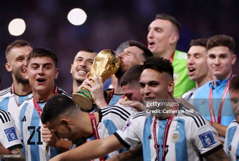 Lionel Messi Of Argentina Kisses The Fifa World Cup Winners Trophy