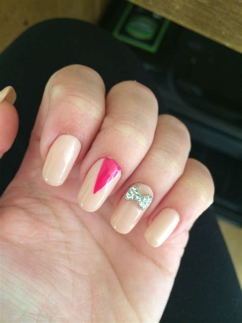 Pretty Pink Squared Nails With A Little Diamanté Bow On One Nail