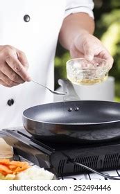 Woman Pouring Cooking Oil Bottle Into Stock Photo 2217908553 | Shutterstock