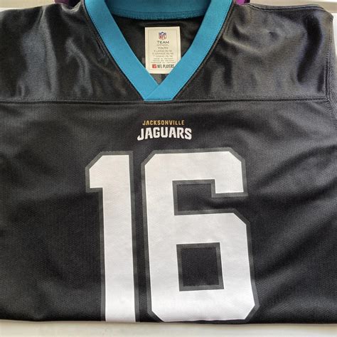 Jaguars Number 16 jersey C Child size large or... - Depop