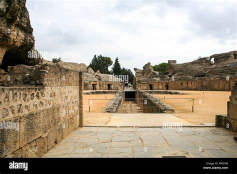 The Ruins Of The Roman Amphitheatre At Italica An Ancient City In