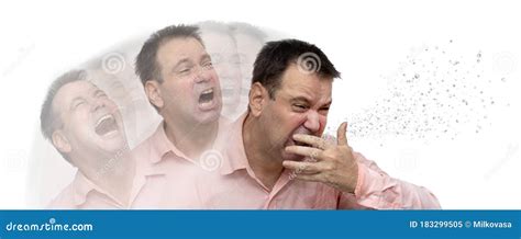 A Man Is Coughs To His Hand Isolated On A White Background Stock