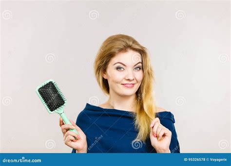 Woman Brushing Her Long Hair With Brush Stock Photo Image Of Ends