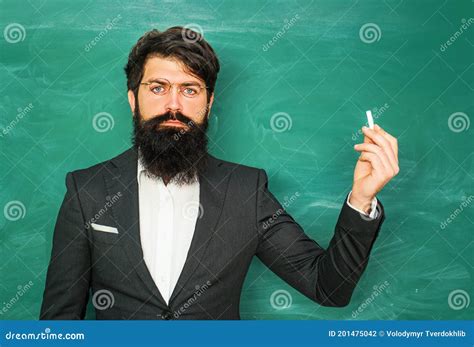 Good Teachers Enjoy Teaching Bearded Professor At School Lesson At Desks In Classroom