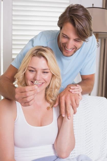 Premium Photo Man Surprising His Girlfriend With An Engagement Ring