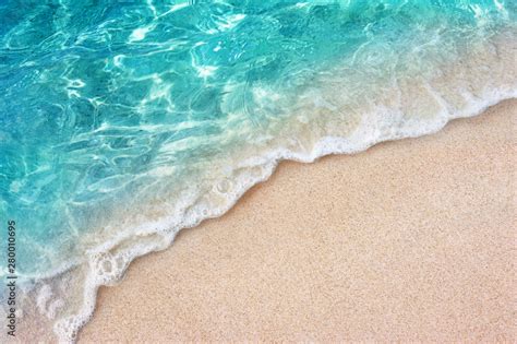 Soft Blue Ocean Wave Or Clear Sea On Clean Sandy Beach Summer Concept