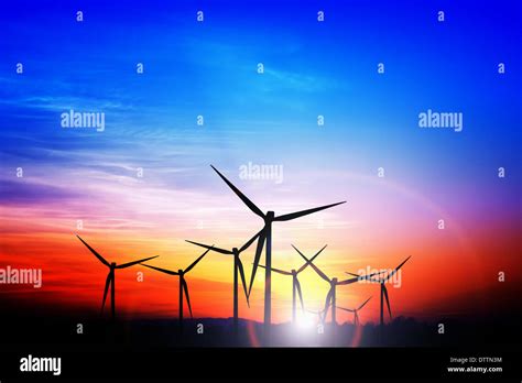 Wind turbines silhouette at sunset Stock Photo - Alamy