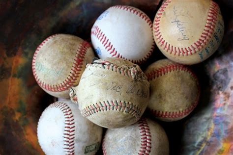 Vintage Signed Baseballs On A Sidewalk