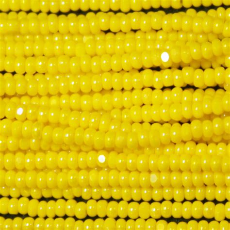 Czech Charlotte True Cut Seed Bead Opaque Corn Yellow Ab Garden