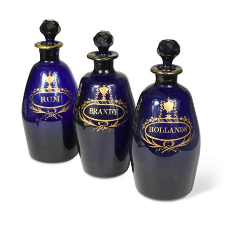 A Set Of Three Bristol Blue Decanters And Stoppers In Cheffins Fine Art