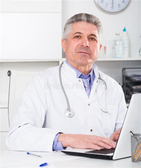Mature Doctor In His Office Stock Photo Image Of Hospital Mature 156943250