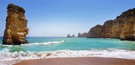 Beautiful Landscape Cliffs In Turquoise Atlantic Ocean Near Beach