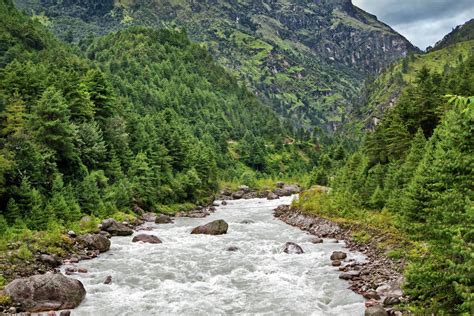 River flowing from himalaya highlands, Nepal - Stock Photo - Dissolve