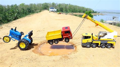 Dump Truck Heavy Loaded Send Accident Pulling Out Crane And Sonalika