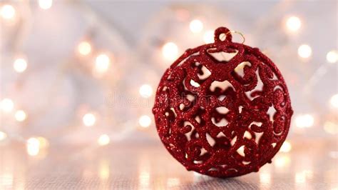 Red Christmas Ornament with Blinking Lights Behind Stock Footage ...