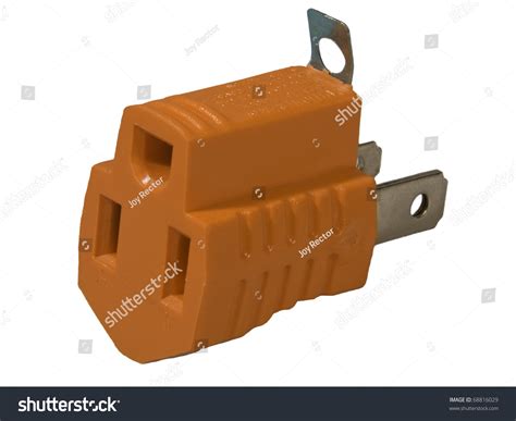 An Orange Grounded Electrical Plug To Aid In Adapting A Two Way Outlet