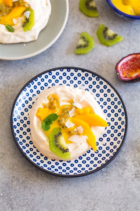 Toasted Coconut Pavlova With Mango Curd Le Petit Eats