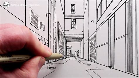 A Hand Is Holding A Marker And Drawing A City Street With Buildings On