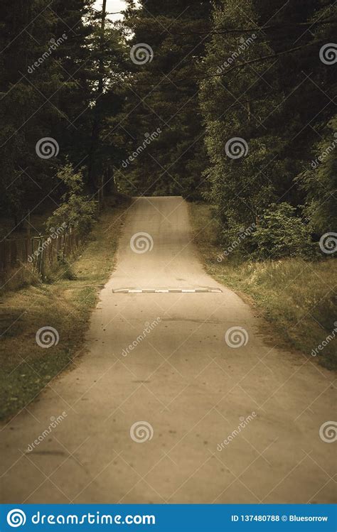 Country Gravel Road With Old And Broken Asphalt Vintage Retro Look