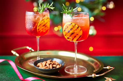 Charred Orange And Cranberry Aperol Spritz Recipe Christmas Cocktail