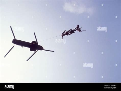 A Marine Corps CH 46 Sea Knight Helicopter Lifts Members Of The 24th