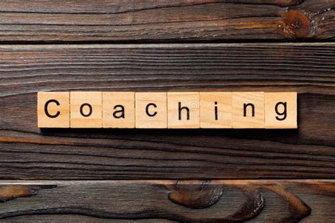 Coaching Word Written On Wood Block Coaching Text On Wooden Table For