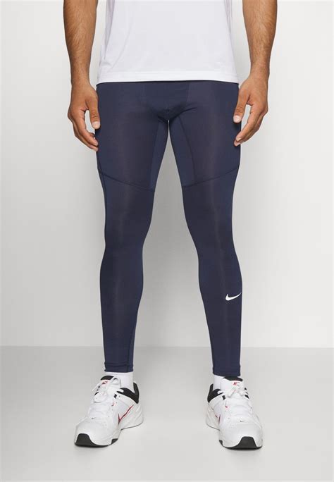 Nike Performance Retuusid Obsidianwhitetumesinine Zalandoee