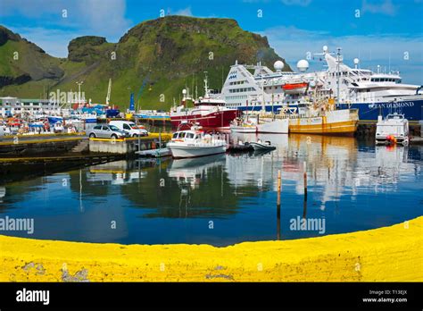 Boats In The Harbor Of Vestmannaeyjar Heimaey Westman Islands