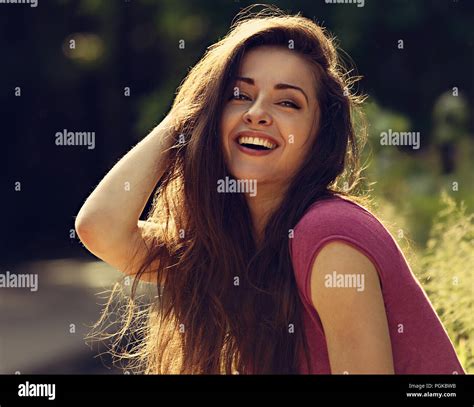 Beautiful Toothy Laughing Enjoying Young Woman Looking With Long Bright