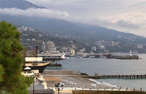 Premium Photo | Coast of yalta in the crimea ships lighthouse pier ...