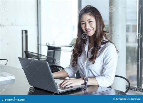 Beautiful Attractive Business Asian Woman Working With Laptop And