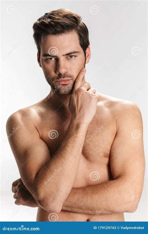 Photo Of Confident Half Naked Man Posing And Looking At Camera Stock