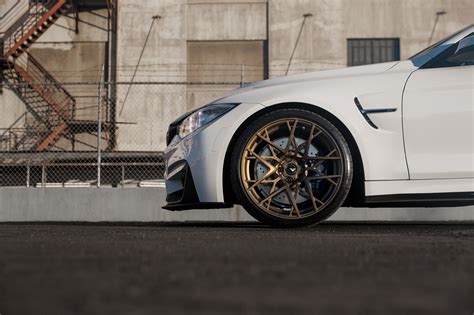 White Car With Bronze Wheels