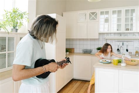 A Person Playing Ukulele · Free Stock Photo