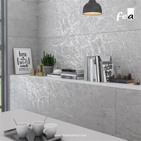 CANYON WHITE CARVING GVT PGVT VITRIFIED TILES Size 2x4 Feet At Rs