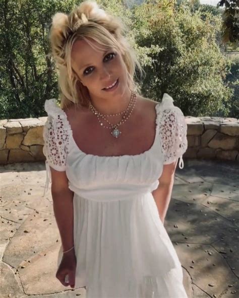 Britney Spears Shows Some Skin Tugging Down Her Dress Cirrkus News