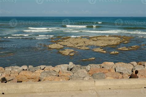 Front View Of Seashore With Waves Breaking On Rocks Atlantic Ocean