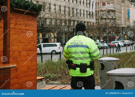 A Police Officer Patrols Public Order While Celebrating Christmas